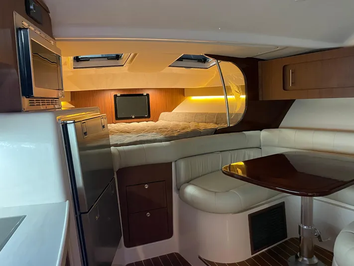  Yacht Photos Pics Interior of 2022 Grady-White Express 370 boat with modern kitchen and cozy seating area.