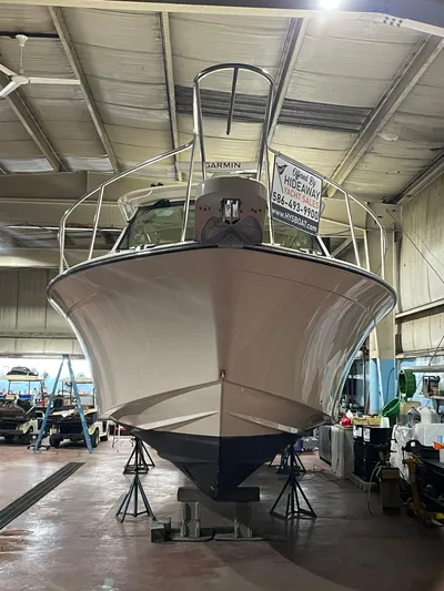  Yacht Photos Pics 2022 Grady-White Express 370 boat in indoor storage facility.
