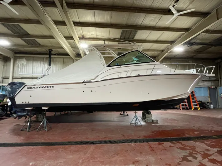  Yacht Photos Pics 2022 Grady-White Express 370 boat in indoor storage facility.
