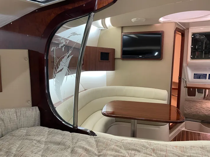  Yacht Photos Pics Interior of 2022 Grady-White Express 370 boat with elegant seating and TV.