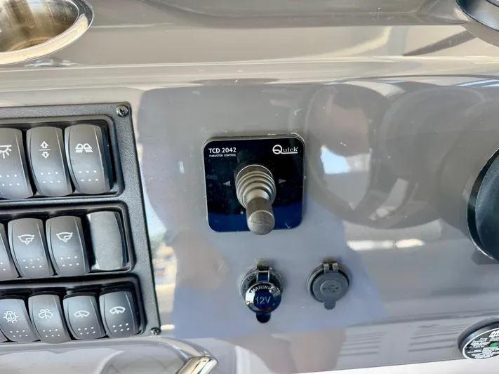  Yacht Photos Pics Control panel of 2025 Beneteau Gran Turismo 36 with switches and joystick.