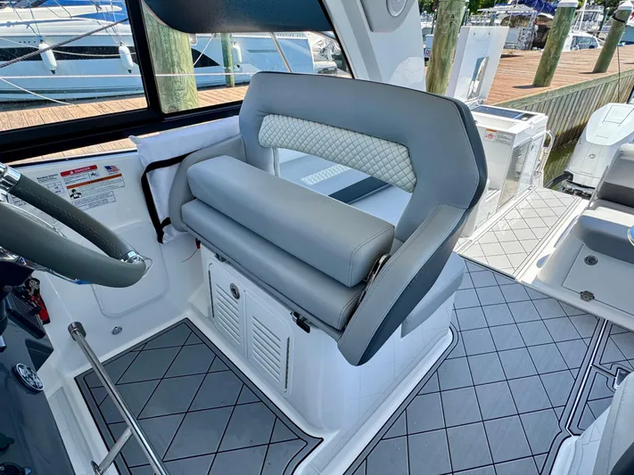  Yacht Photos Pics 2025 Beneteau Gran Turismo 36 cockpit with modern seating and sleek design.