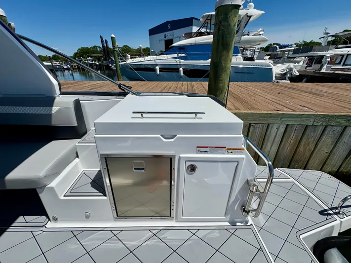  Yacht Photos Pics 2025 Beneteau Gran Turismo 36 yacht deck with sleek storage compartments.