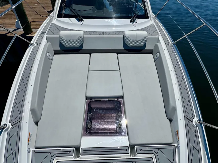  Yacht Photos Pics 2025 Beneteau Gran Turismo 36 boat with spacious sunbathing area and sleek design.