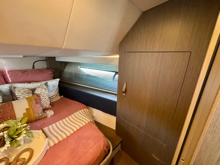  Yacht Photos Pics Luxurious cabin interior of 2025 Beneteau Gran Turismo 36 yacht with cozy bedding.