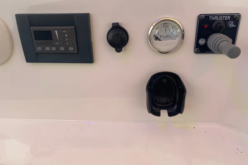 Gettsea Yacht Photos Pics Control panel of a 2008 Silverton 45 Convertible boat with fuel gauge and thruster controls.