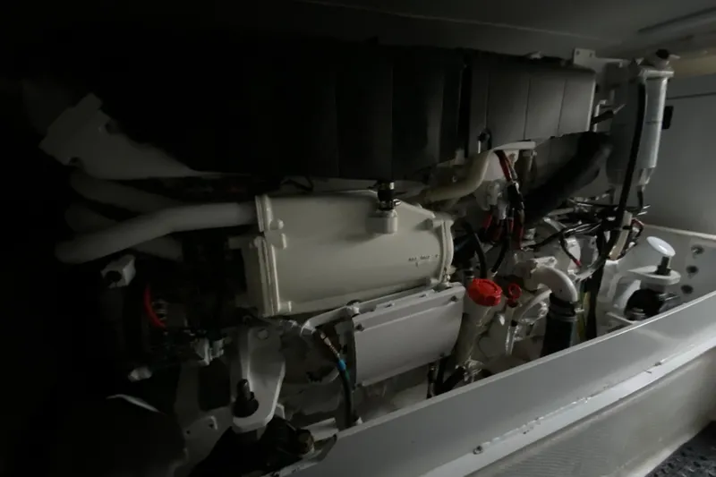 Gettsea Yacht Photos Pics Engine compartment of a 2008 Silverton 45 Convertible boat, showcasing mechanical components.