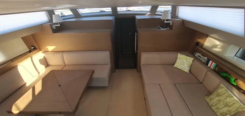 Aida II Yacht Photos Pics Luxurious interior of 2018 CNB 66 yacht with elegant seating and modern design.