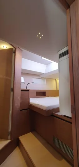 Aida II Yacht Photos Pics Luxurious cabin interior of a 2018 CNB 66 yacht with modern design elements.