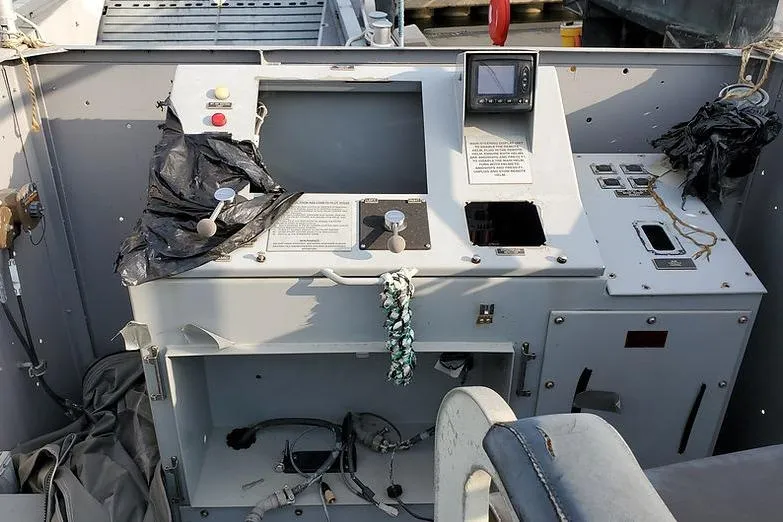  Yacht Photos Pics Control panel of a 1970 COMMERICAL BOAT LCU-135, featuring navigation equipment and controls.