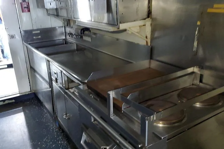  Yacht Photos Pics Commercial boat kitchen with stainless steel appliances, LCU-135 model, 1970.