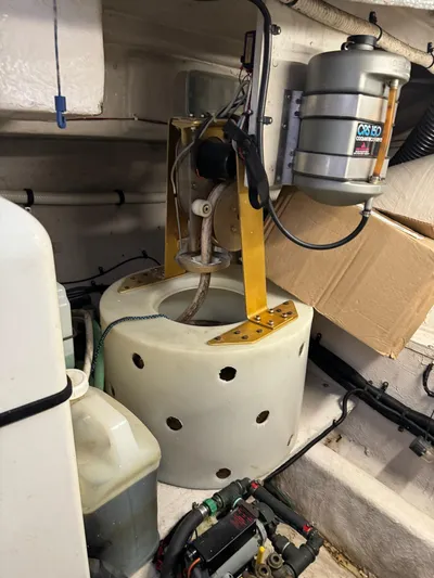 Deja Vue Yacht Photos Pics Engine room of a 1995 Sea Ray 500 yacht with mechanical components.