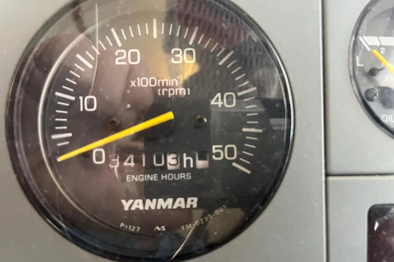  Yacht Photos Pics Close-up of a Yanmar engine hour meter showing 3410 hours on a PDQ Passage Maker 2004.