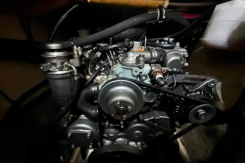  Yacht Photos Pics Engine of a 2004 PDQ Passage Maker boat, showcasing mechanical components and belts.