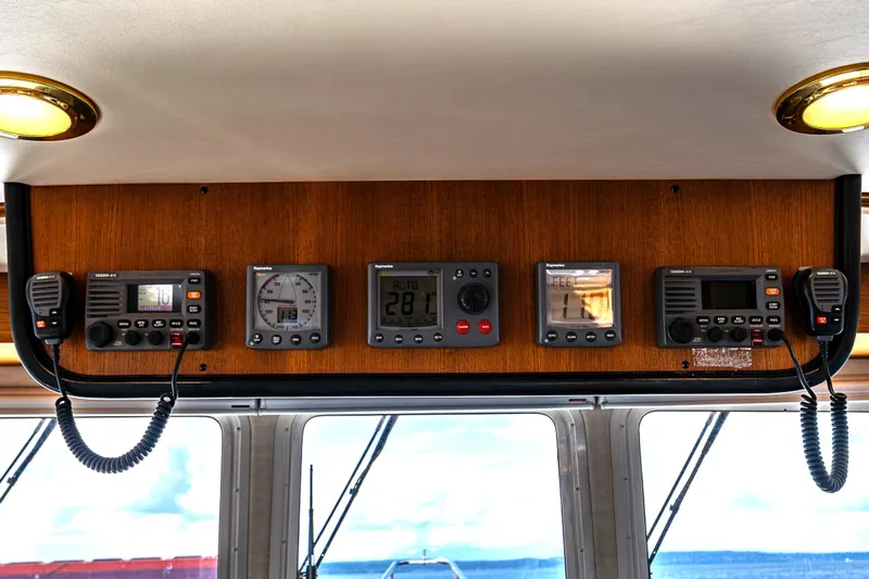 Speakeasy Yacht Photos Pics Control panel of a 2007 Nordic Tug 54 with navigation and communication equipment.
