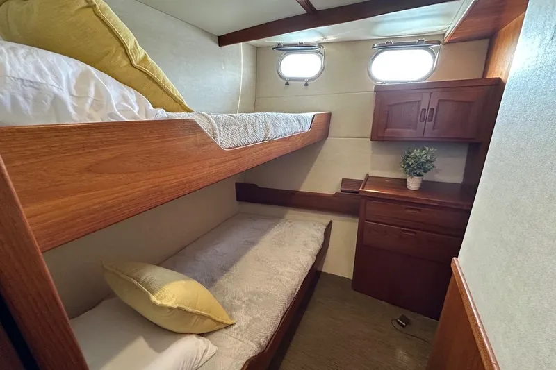 Speakeasy Yacht Photos Pics Cozy cabin with bunk beds in 2007 Nordic Tug 54 yacht.