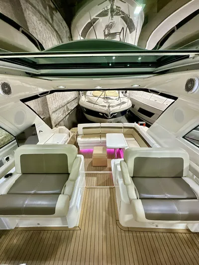 Sand Bar Yacht Photos Pics 2011 Sea Ray 450 Sundancer interior with luxurious seating and modern design.