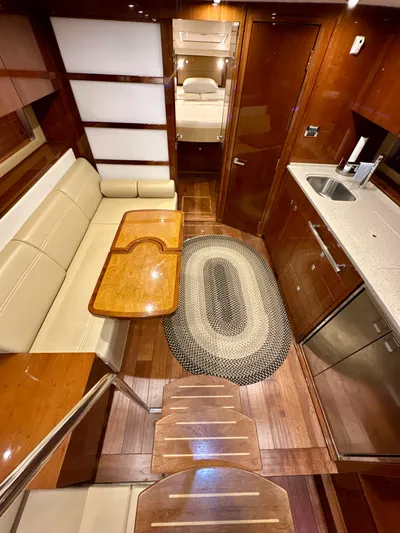 Sand Bar Yacht Photos Pics Luxurious interior of a 2011 Sea Ray 450 Sundancer yacht with modern amenities.