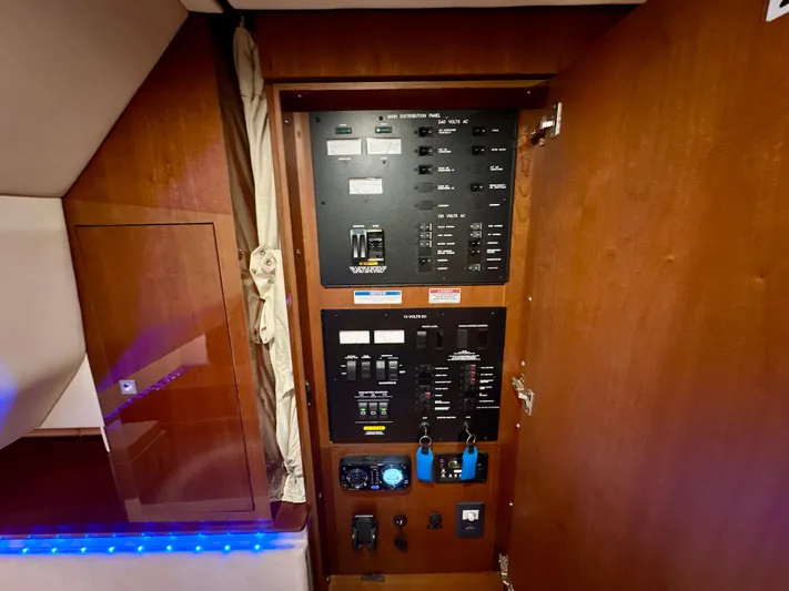 Sand Bar Yacht Photos Pics Electrical panel inside 2011 Sea Ray 450 Sundancer yacht, featuring switches and controls.
