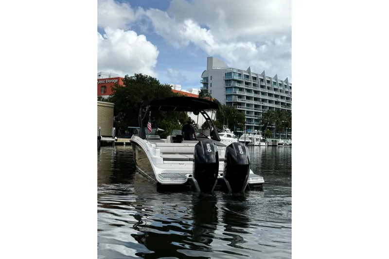 Yacht Photos Pics 2021 Sea Ray SDX 290 Outboard boat docked in marina, with twin engines visible.
