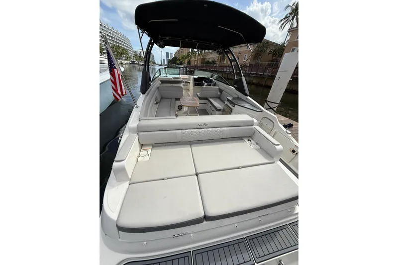  Yacht Photos Pics 2021 Sea Ray SDX 290 Outboard boat with spacious seating and sleek design.