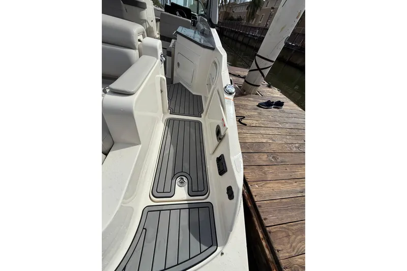  Yacht Photos Pics 2021 Sea Ray SDX 290 Outboard boat interior with sleek seating and deck design.