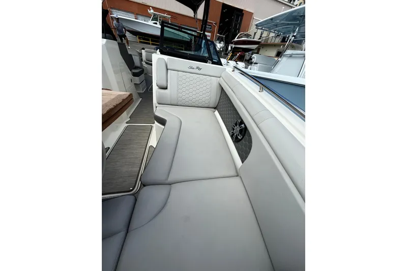  Yacht Photos Pics 2021 Sea Ray SDX 290 Outboard interior with luxurious seating and modern design.