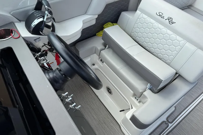  Yacht Photos Pics 2021 Sea Ray SDX 290 Outboard helm with steering wheel and luxurious seating.