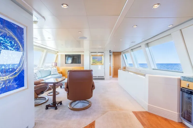 Ruffian Yacht Photos Pics Luxurious interior of 2001 Delta Marine Tri-Deck yacht with ocean view and modern furnishings.