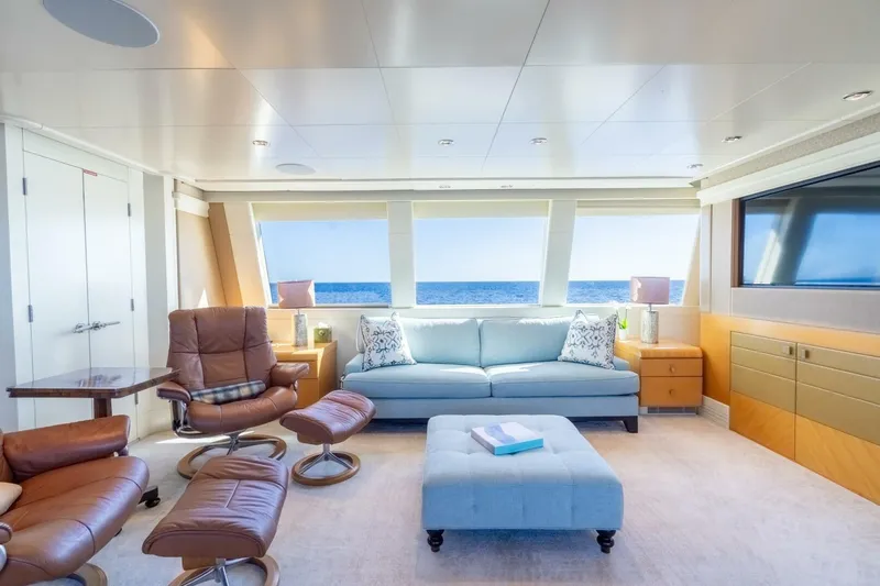 Ruffian Yacht Photos Pics Luxurious interior of 2001 Delta Marine Tri-Deck yacht with ocean view and elegant furnishings.