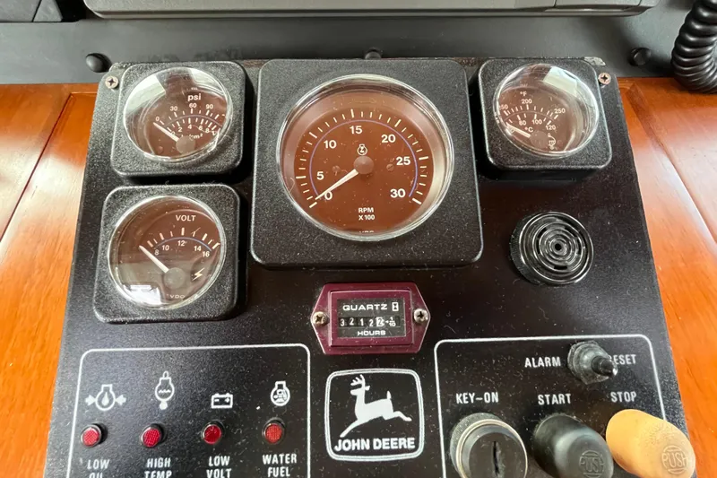 Abina Yacht Photos Pics Instrument panel of a 2001 Kadey-Krogen 39 boat with John Deere engine gauges.