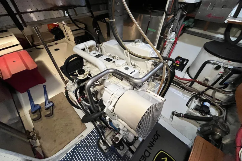Abina Yacht Photos Pics Engine room of 2001 Kadey-Krogen 39 yacht, showcasing mechanical components and equipment.