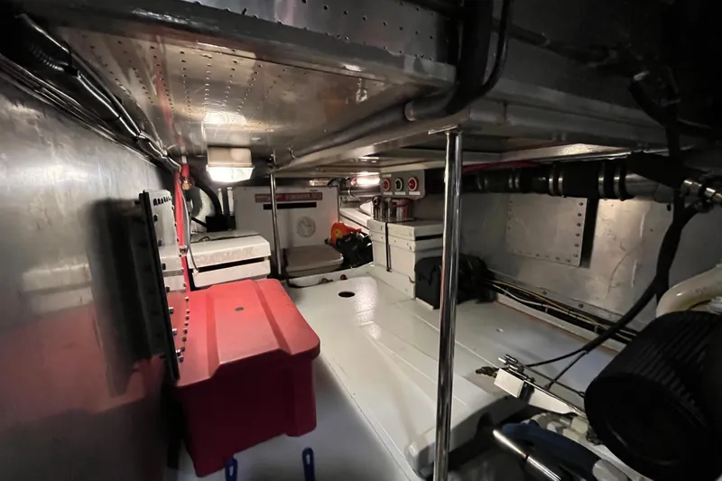 Abina Yacht Photos Pics Engine room of 2001 Kadey-Krogen 39 boat, featuring equipment and storage.