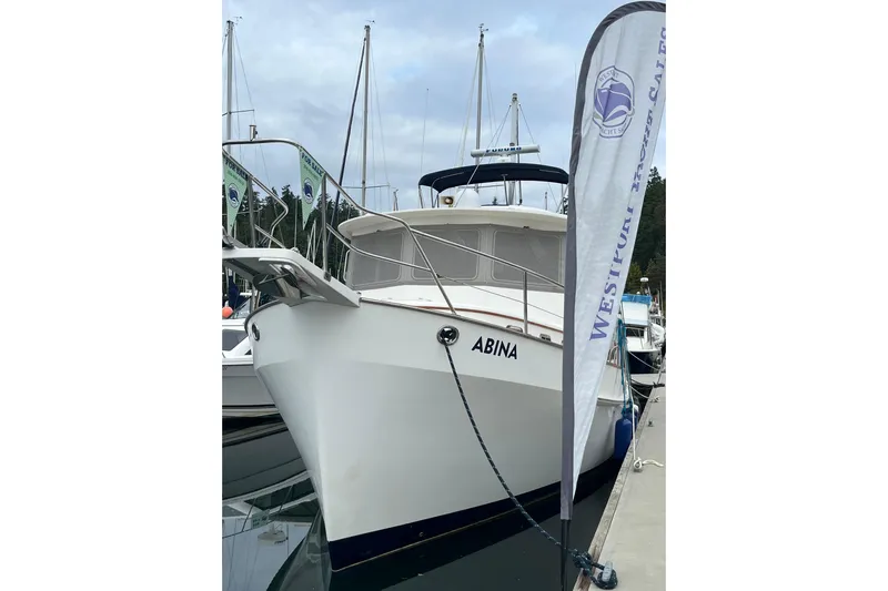 Abina Yacht Photos Pics Kadey-Krogen 39 yacht from 2001 named "Abina" docked at a marina.