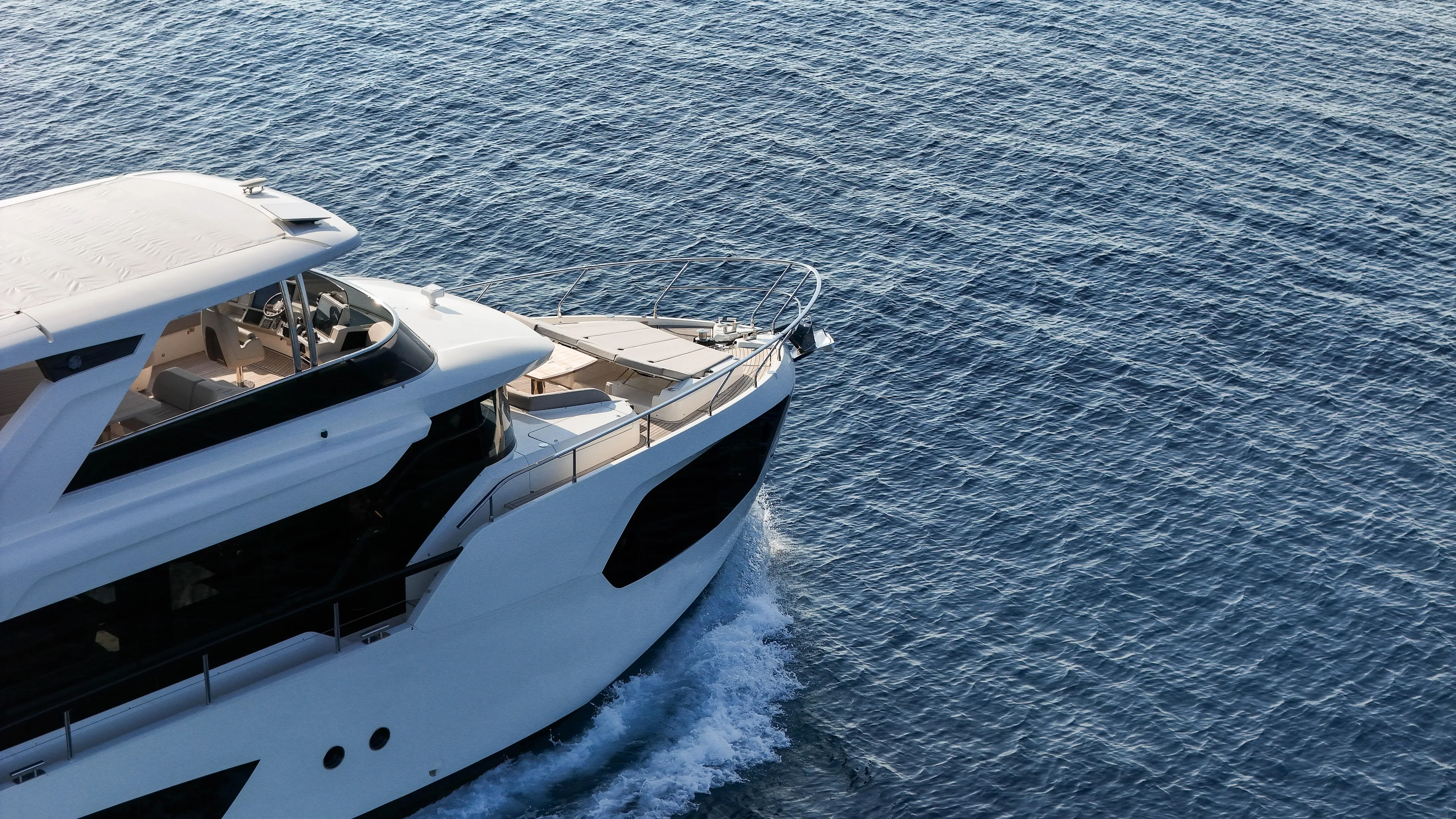  Yacht Photos Pics Luxury yacht Absolute Navetta 68 cruising on open sea, 2023 model.