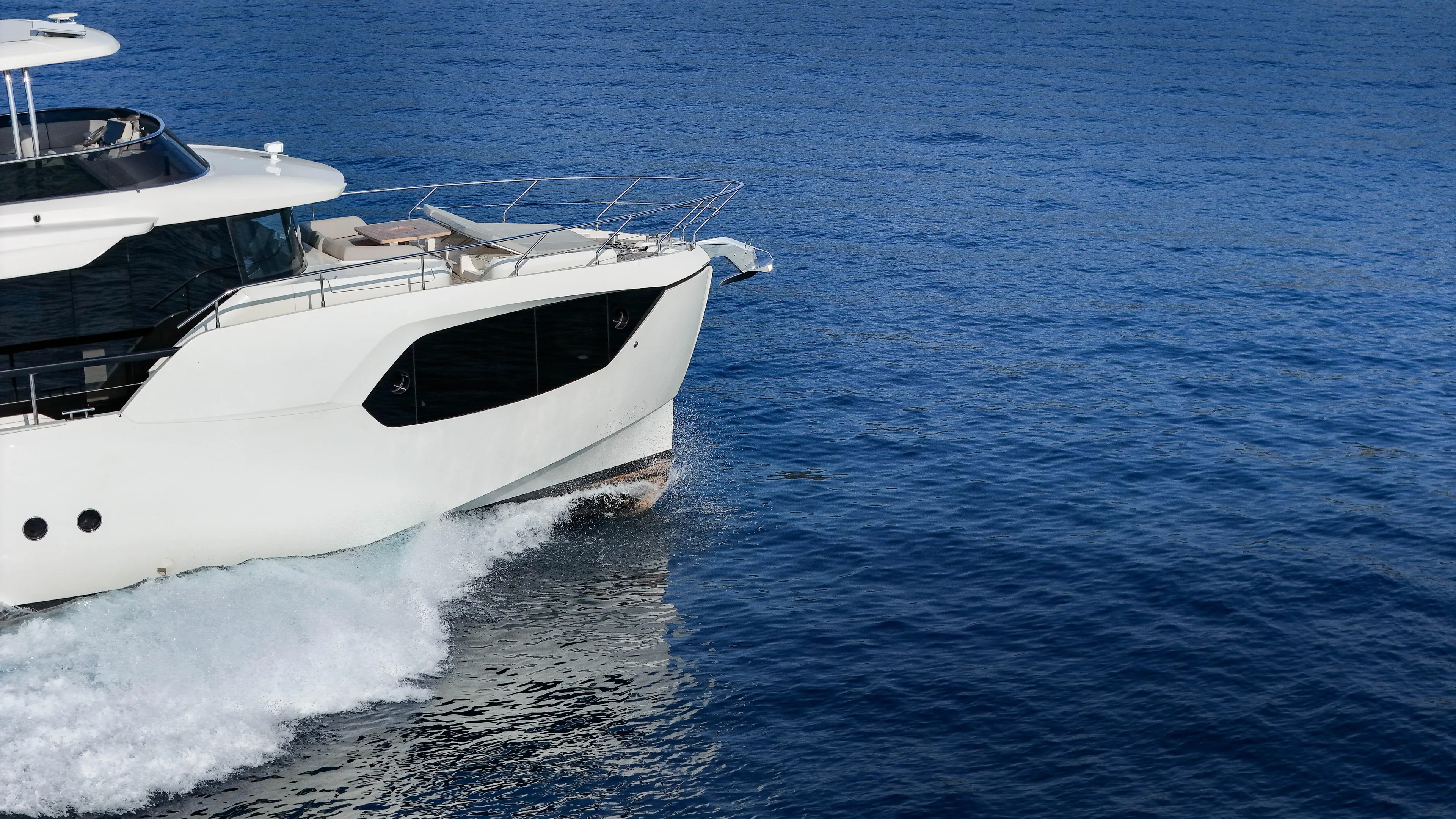  Yacht Photos Pics 2023 Absolute Navetta 68 yacht cruising on open blue sea.