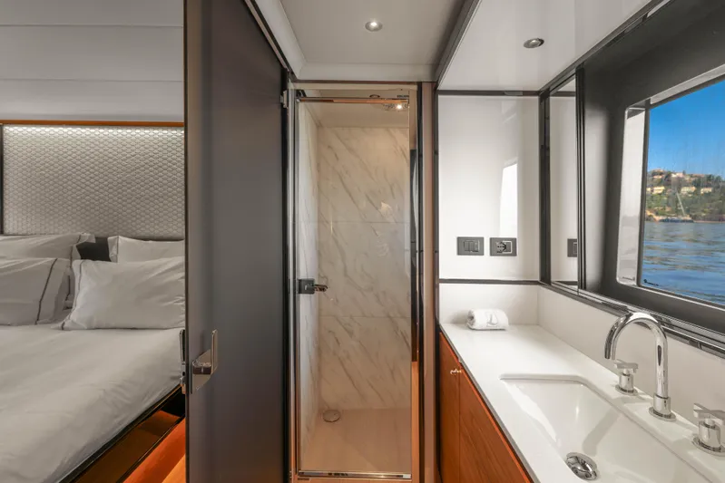  Yacht Photos Pics Luxurious bathroom and bedroom interior on 2023 Absolute Navetta 68 yacht.