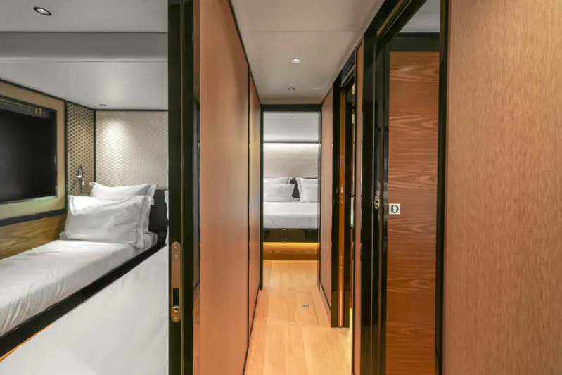  Yacht Photos Pics Luxurious interior of 2023 Absolute Navetta 68 yacht, featuring elegant bedrooms and modern design.