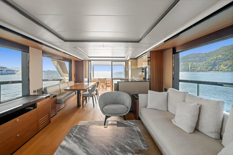  Yacht Photos Pics Luxurious interior of 2023 Absolute Navetta 68 yacht with modern furnishings and scenic ocean views.