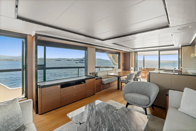  Yacht Photos Pics Luxurious interior of 2023 Absolute Navetta 68 yacht with ocean view and modern furnishings.