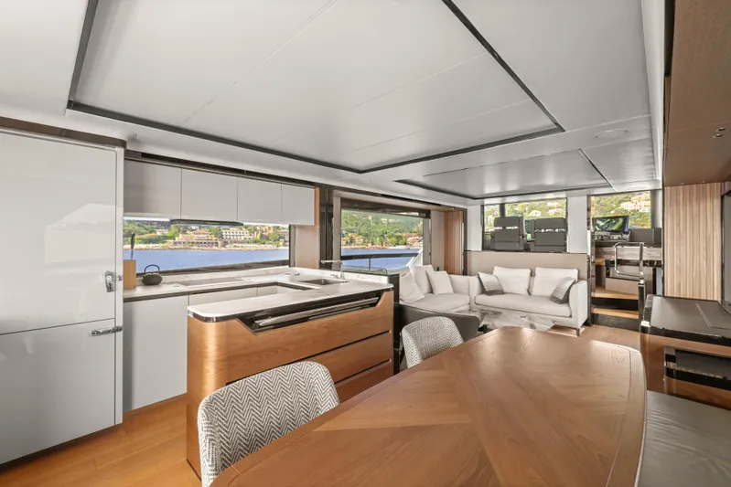  Yacht Photos Pics Luxurious interior of 2023 Absolute Navetta 68 yacht with modern furnishings and scenic views.