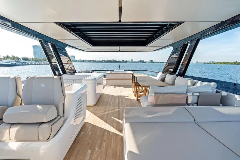  Yacht Photos Pics Luxurious 2023 Ferretti Yachts 860 interior with elegant seating and ocean view.