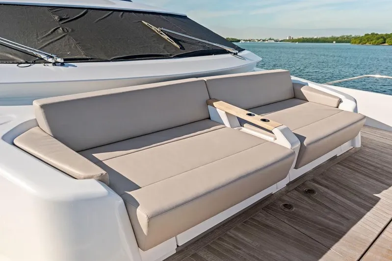  Yacht Photos Pics Luxury seating on 2023 Ferretti Yachts 860, overlooking serene waters.