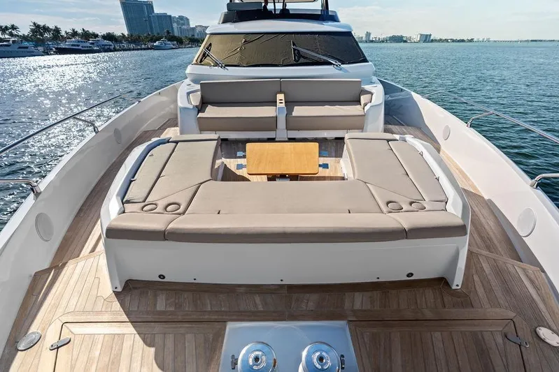  Yacht Photos Pics Luxurious 2023 Ferretti Yachts 860 deck with elegant seating and ocean view.