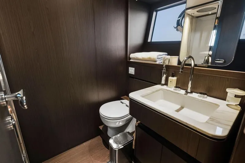  Yacht Photos Pics Luxurious bathroom in 2023 Ferretti Yachts 860, featuring modern fixtures and elegant design.