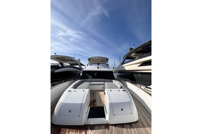  Yacht Photos Pics Luxury yacht Benetti Azimut MAGELLANO 66, 2025 model, docked under clear blue sky.