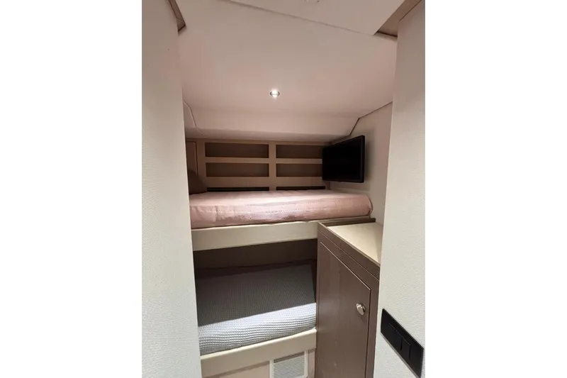  Yacht Photos Pics 2025 Benetti Azimut MAGELLANO 66 yacht cabin with bunk beds and TV.