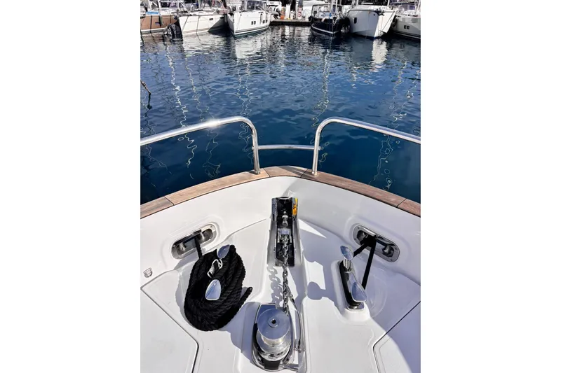  Yacht Photos Pics Bow view of 2025 Benetti Azimut MAGELLANO 66 yacht in marina.