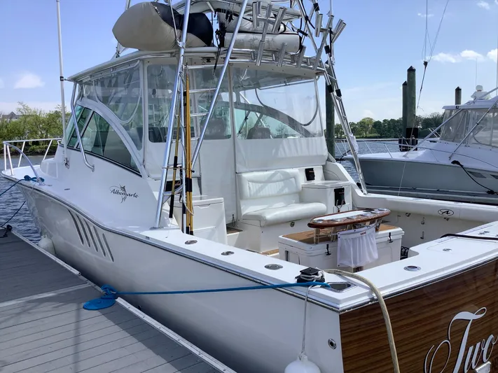 Two & Five Yacht Photos Pics 2013 Albemarle 360 Express Fisherman boat docked, featuring spacious deck and fishing equipment.