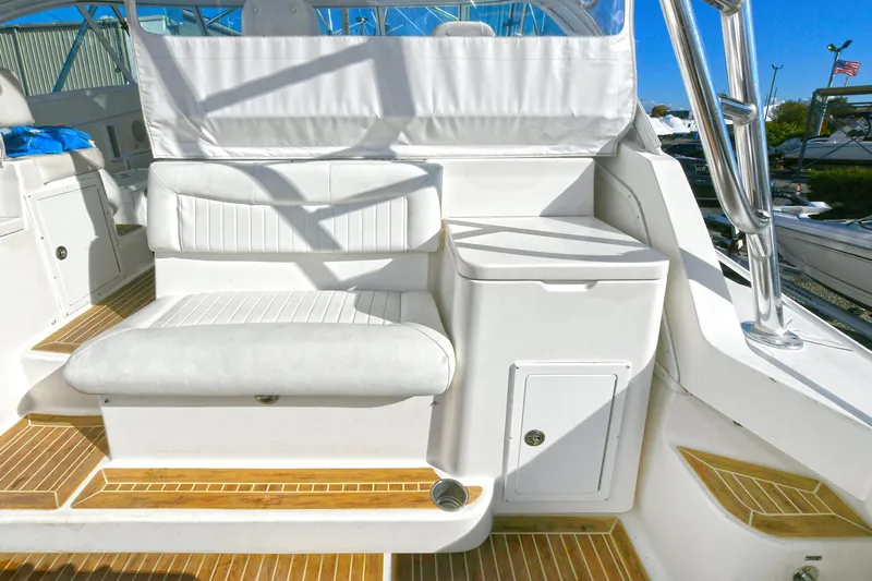 Two & Five Yacht Photos Pics 2013 Albemarle 360 Express Fisherman interior with white seating and wooden flooring.